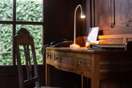 Writing desk by the window in the one-bedroom villa