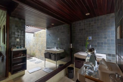 En-suite bathroom opening to a private courtyard